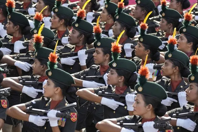 Sri Lanka army women's corp  soldiers march during the 75th Independence Day ceremony in Colombo, Sri Lanka, Saturday, February 4, 2023. (Photo by Eranga Jayawardena/AP Photo)