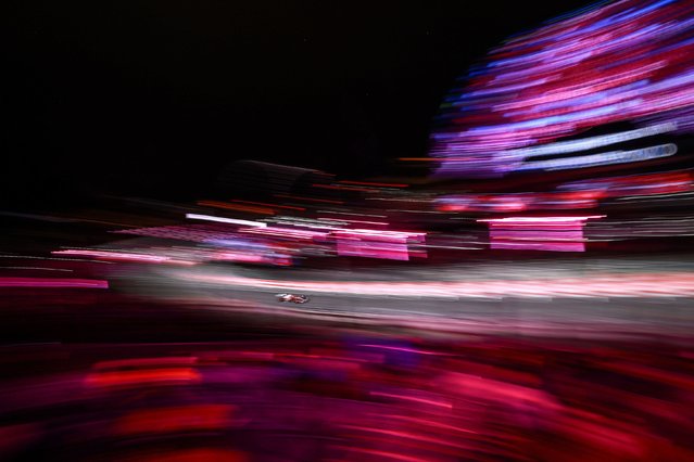 In this photo, taken with a long exposure, Formula One driver Charles Leclerc speeds down the track during a practice lap in Las Vegas on Thursday, November 20, 2025. (Photo by Hector Vivas/Getty Images)
