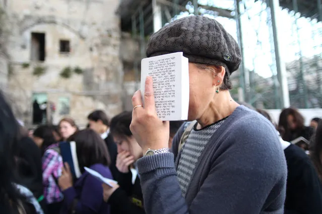 “Women's Prayer”. This was my first time seeing many women from the youngest to the oldest praying seriously with all of their heart and mind. Location: The Western Wall in the midst of the Old City in Jerusalem. (Photo and caption by Lydia Isnanto/National Geographic Traveler Photo Contest)