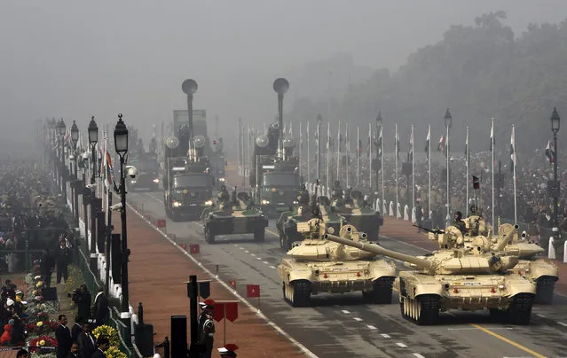 Indian Army's T-90 Bhishma tanks (front) are driving during the Republic Day parade in New Delhi, India, January 26, 2016. (Photo by Altaf Hussain/Reuters)