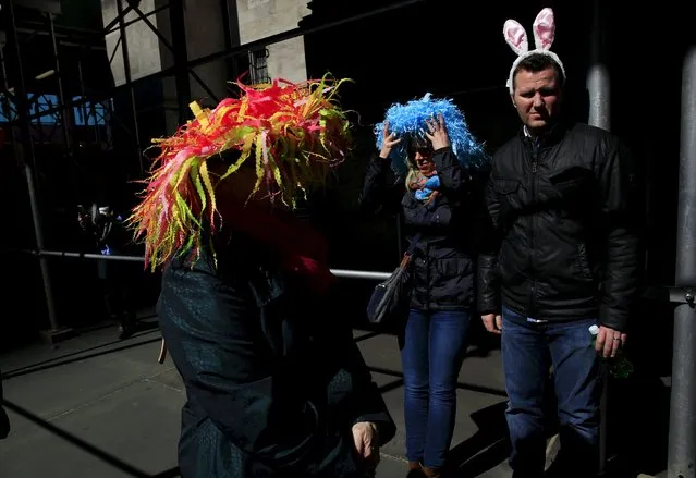 People take part in the Easter Parade and Bonnet Festival along 5th Avenue in New York City April 5, 2015. (Photo by Eric Thayer/Reuters)