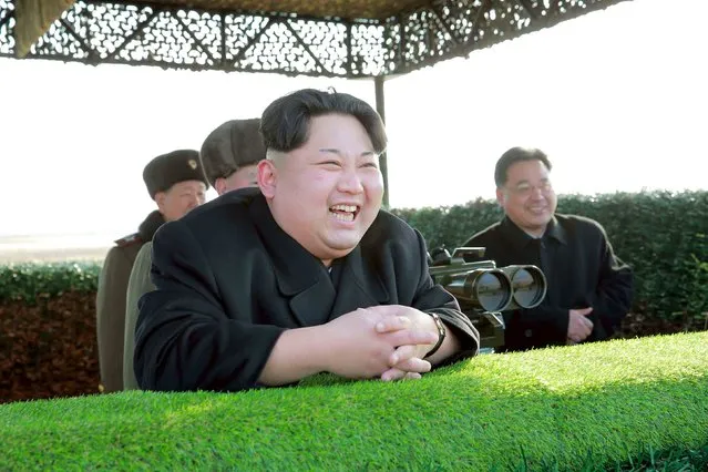 North Korean leader Kim Jong Un reacts during a test-fire of an anti-tank guided weapon in this undated photo released by North Korea's Korean Central News Agency (KCNA) in Pyongyang February 27, 2015. (Photo by Reuters/KCNA)