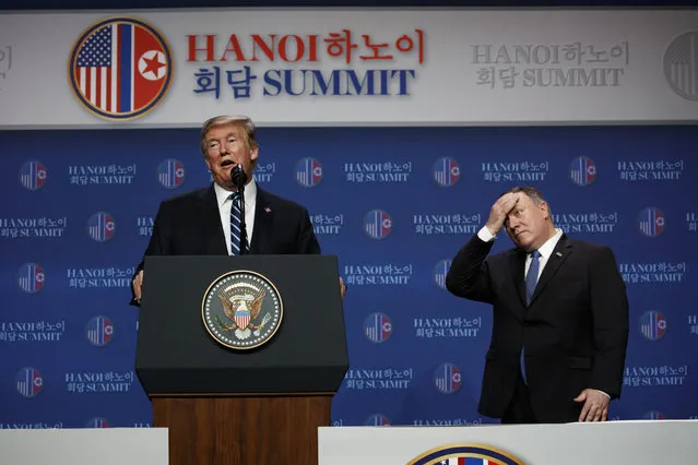 President Donald Trump speaks as Sec of State Mike Pompeo looks on during a news conference after a summit with North Korean leader Kim Jong Un, Thursday, February 28, 2019, in Hanoi. (Photo by Evan Vucci/AP Photo)