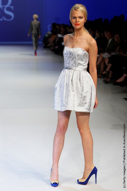 A model showcases designs by Camilla on the catwalk at the David Jones Spring/Summer 2011