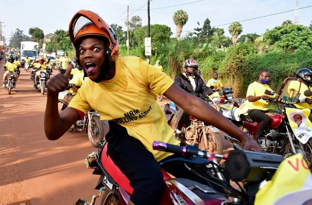 Supporters of Uganda's National Resistance Movement (NRM) party celebrate the victory of President Yoweri Museveni in the concluded general elections in Kampala, Uganda on January 16, 2021. (Photo by Abubaker Lubowa/Reuters)