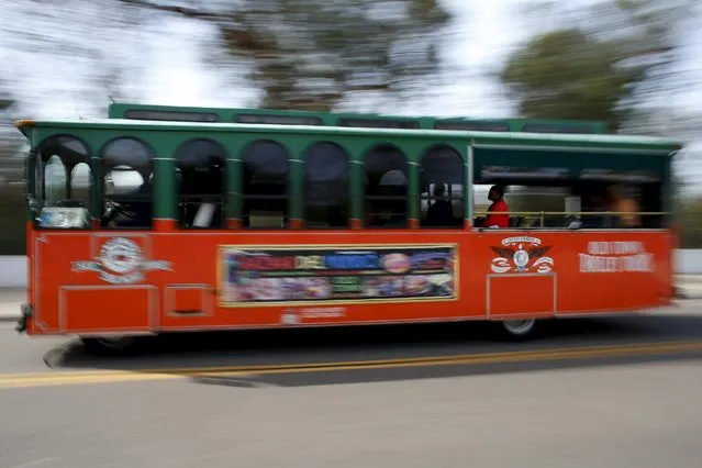 Passengers ride a tourists bus through Balboa Park in San Diego, California April 6, 2016. (Photo by Mike Blake/Reuters)
