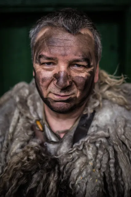 “Portrait of a buso man”. Portrait of a man during the annual Poklade (Buso festivities) in Mohacs, Southern Hungary. “Buso” wear sheep fur cloak and wooden masks and use all kinds of tricks to scare and chase away winter together with bad spirits. Busos rarely remove their masks during the festival, especially in public. I took this photo in a private yard, where I could snap portraits without masks. Photo location: Mohacs, Hungary. (Photo and caption by Zsolt Repasy/National Geographic Photo Contest)
