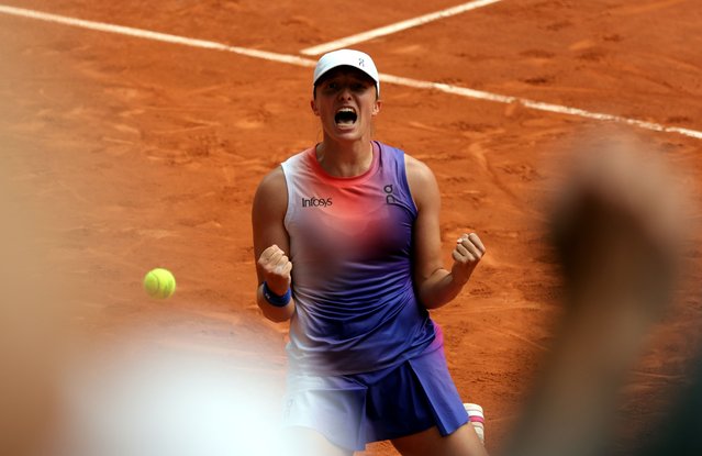 Iga Swiatek of Poland celebrates winning her Women's Singles final match against Jasmine Paolini of Italy during the French Open Grand Slam tennis tournament at Roland Garros in Paris, France, 08 June 2024. (Photo by Teresa Suarez/EPA)