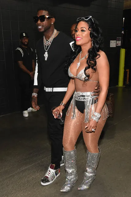 Gucci Mane (L) and Keyshia Ka'Oir backstage at V-103 Live Pop Up Concert at Philips Arena on March 31, 2018 in Atlanta, Georgia. (Photo by Paras Griffin/Getty Images)