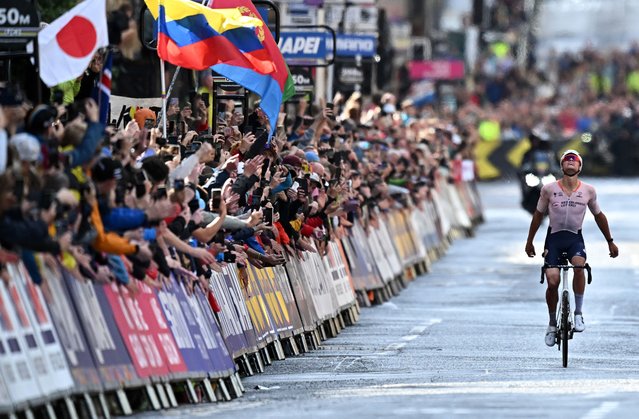 Netherland's Mathieu van der Poel reacts after winning the men's Elite Road Race at the Cycling World Championships in Edinburgh, Scotland on August 6, 2023. men's Elite Road Race at the Cycling World Championships in Edinburgh, Scotland on August 6, 2023. Netherland's Mathieu van der Poel took first place in the race that began in Scotland's capital city, Edinburgh, and ended with a street circuit in Glasgow. Belgium's Wout van Aert came second with Slovenia's Tadej Pogacar finishing in third place. (Photo by Oli Scarff/AFP Photo)