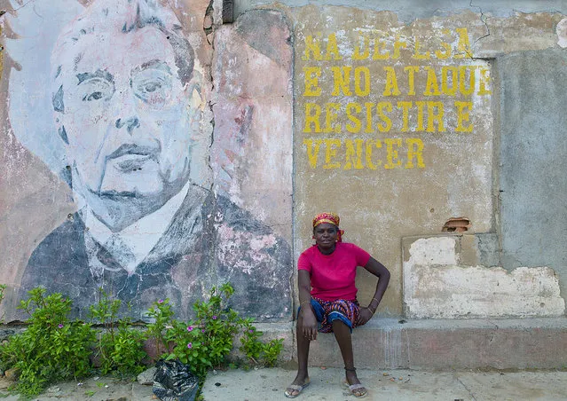 “Old propaganda wall painting with Leonid Brejnev – Bilaiambundo Angola. For years, Angola has been the little sister of Cuba and Russia, and you can still see, if you search well, some propaganda paintings about work, economy, society etc from the 70's... Most of them have been removed or destroyed. But i have seen some Fidel Castro portraits in many places. Even now, the big companies tend to communicate like in a communist country, they glorify the future of the country etc etc.
The funny thing is that this painting is on the wall of a Police station. Police in Angola is a shame, with lots of controls, asking for money, for food, for drinks... In December 1956, in Portuguese Angola the Angolan Communist Party (PCA) merged with the Party of the United Struggle for Africans in Angola (PLUA) to form the People's Movement for the Liberation of Angola with Viriato da Cruz, the President of the PCA, as Secretary General.
During 1975, before the official Portuguese withdrawal, the civil war in Angola intensifies. In fighting for control of the capital city, Luanda, the MPLA succeeds in driving out both its rivals. UNITA, which claims to enjoy wider popular support than the other groups, argues that Portugal must fulfil its last colonial duty and supervise elections.
But the Portuguese, eager to leave as quickly as possible, abandon the country without formally handing over control to any succeeding government. The MPLA, in possession of the capital and with guaranteed support from the USSR and Cuba, declared itself the government of independent Angola. Agostinho Neto, a distinguished poet who had led the MPLA since 1962, became president.
The Soviet Union supported the MPLA-PT as a liberation movement before independence and formalized its relationship with the MPLAPT government through the Treaty of Friendship and Cooperation and a series of military agreements beginning in 1975. Once it became clear that the MPLA-PT could, with Cuban support, remain in power, the Soviet Union provided economic and technical assistance and granted Angola most-favored-nation status. In 1976 MPLA adopted Marxism-Leninism as the party ideology. It maintained close ties with the Soviet Union and the Communist bloc, establishing socialist economic policies and a one-party state.
For the first decade after independence, trade with communist states was not significant, but in the late 1980s dos Santos sought expanded economic ties with the Soviet Union, China, and Czechoslovakia and other nations of Eastern Europe as the MPLA-PT attempted to diversify its economic relations and reduce its dependence on the West. In October 1986, Angola signed a cooperative agreement with the Council for Mutual Economic Assistance (Comecon), a consortium dedicated to economic cooperation among the Soviet Union and its allies. As part of the Comecon agreement, Soviet support for Angolan educational and training programs was increased. In 1987 approximately 1,800 Angolan students attended institutions of higher education in the Soviet Union. The Soviet Union also provided about 100 lecturers to Agostinho Neto University in Luanda, and a variety of Soviet-sponsored training programs operated in Angola, most with Cuban instructors. Approximately 4,000 Angolans studied at the international school on Cuba's renowned Isle of Youth. More Angolan students were scheduled to attend the Union of Young Communists' School in Havana in 1989