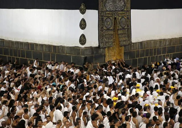 Muslim pilgrims pray around the holy Kaaba at the Grand Mosque ahead of the annual haj pilgrimage in Mecca September 22, 2015. (Photo by Ahmad Masood/Reuters)