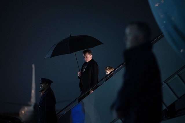 Elon Musk and his son X Æ A-12 step off Air Force One after arriving at Joint Base Andrews in Maryland on Monday, March 17, 2025. Musk is leading the Department of Government Efficiency. (Photo by Brendan Smialowski/AFP Photo)