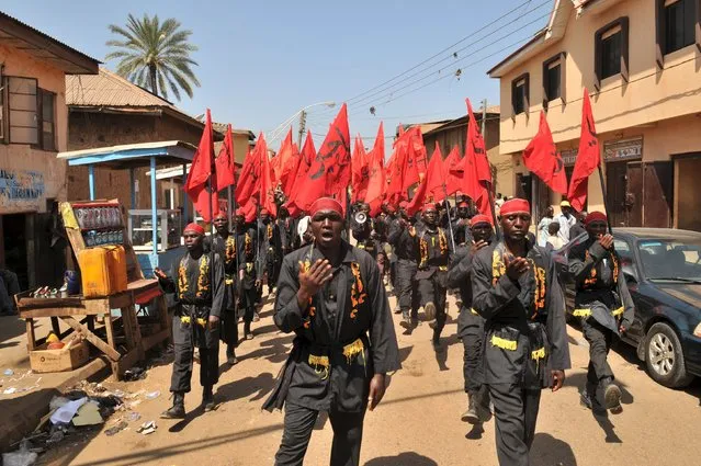 Shi'ite Muslims take part in a rally to commemorate Ashura in Kano, Nigeria October 24, 2015. Ashura, which falls on the 10th day of the Islamic month of Muharram, commemorates the death of Imam Hussein, grandson of Prophet Mohammad, who was killed in the seventh century battle of Kerbala. (Photo by Reuters/Stringer)
