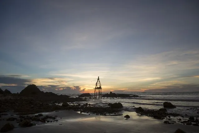 A crude oil tower is seen on the seashore in Kyaukpyu township, Rakhine state, Myanmar October 5, 2015. (Photo by Soe Zeya Tun/Reuters)