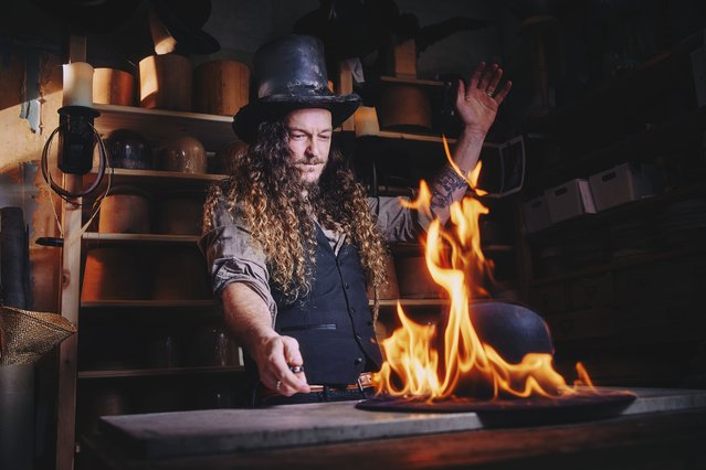 Paul Ventress uses traditional techniques, including steam and flame, to shape bespoke hats in his York studio, UK on October 15, 2025. (Photo by James Glossop/Times Media Ltd)