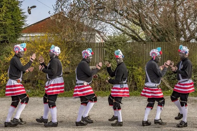 The Coconut Dancers of Bacup continue to perform on April 17, 2022 in the Lancashire village with blackened faces, which the folk group insists represents the coal dust-covered faces of the miners who devised their clog dances. (Photo by James Glossop/The Times)
