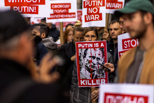 People take part in a protest marking the approaching 1000th day of Russia's full-scale invasion of Ukraine on the 24th February 2022, outside the Consulate General of the Russian Federation in New York City, U.S. November 17, 2024. (Photo by Eduardo Munoz/Reuters)