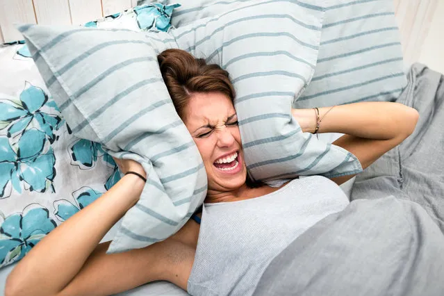 In bed: woman can't sleep. (Photo by Ilbusca/Getty Images)