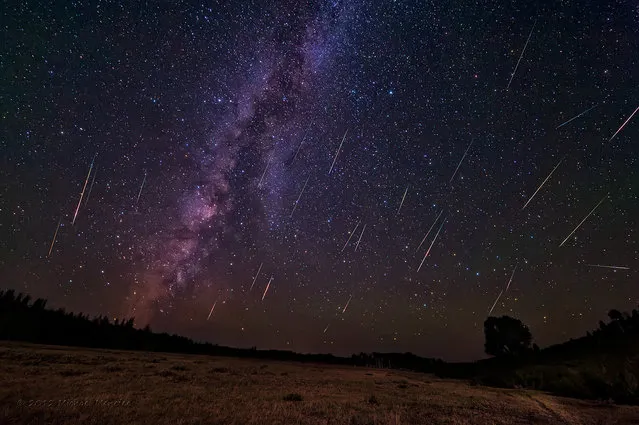 Photographer Michael Menfee created this composite image – made from 324 shots of 25 seconds each – in August 2012, near Copperton, Wyo. Another image was taken at a longer shutter speed, he writes, for foreground lighting from the moonlight. “When I saw how clearly the Milky Way was rendering to the west, I couldn't resist pointing one camera away from the meteor shower radiant to test my luck. With over 27 meteors, my luck was very good!” he writes. (Photo by Michael Menfee)