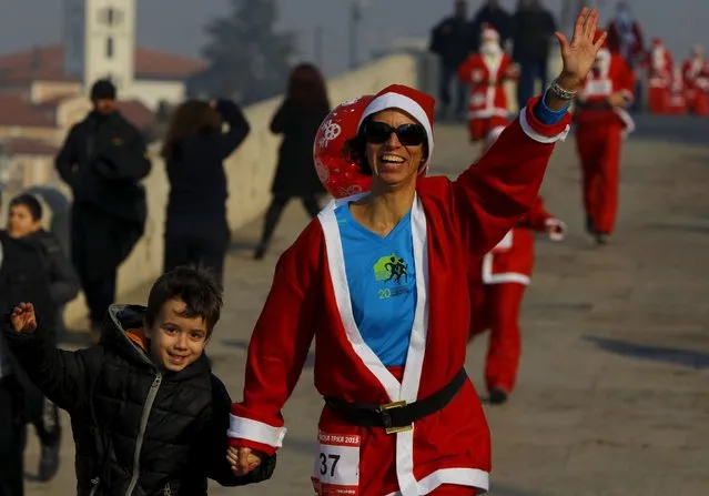 People dressed as Santa Claus run during a race in Skopje, Macedonia December 27, 2015. (Photo by Ognen Teofilovski/Reuters)