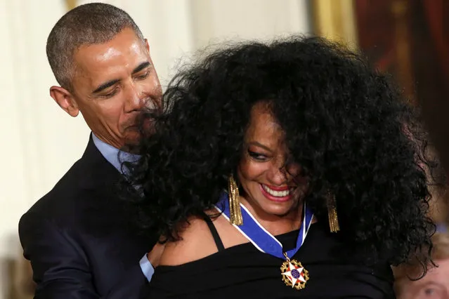 U.S. President Barack Obama presents the Presidential Medal of Freedom to singer Diana Ross during a ceremony in the White House East Room in Washington, U.S., November 22, 2016. (Photo by Carlos Barria/Reuters)