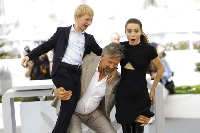 (From L) Actor Timeo Mahaut, Belgian actor Johan Heldenbergh and French actress Mallory Wanecque attend a photocall for the film “Les Pires (The Worst Ones)” at the 75th edition of the Cannes Film Festival in Cannes, southern France, on May 22, 2022. (Photo by Stephane Mahe/Reuters)