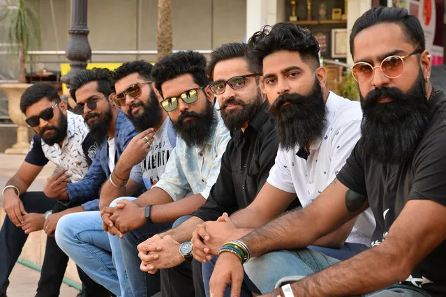 Indian contestants pose for a photograph during a beard and moustache competetion organised by the Bangalore Beard Club in Bangalore on November 26, 2016. (Photo by Kiran Manjunath/AFP Photo)
