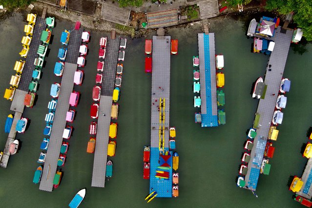 An aerial view shows leisure boats moored at Liyu Lake in Hualien, Taiwan on April 11, 2021. (Photo by Sam Yeh/AFP Photo)