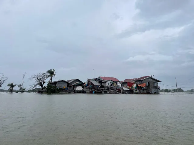 A general view of houses submerged in floodwaters due to monsoon rains enhanced by a recent typhoon in Calumpit, Bulacan Province, Philippines on August 1, 2023. (Photo by Adrian Portugal/Reuters)