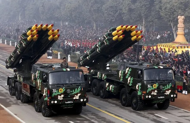 Indian army officers stand on vehicles displaying missiles during the Republic Day parade in New Delhi, India, January 26, 2016. (Photo by Altaf Hussain/Reuters)