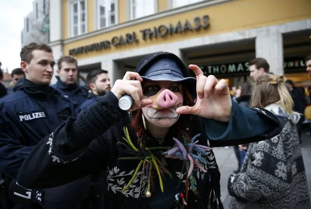 A protester takes part in a demonstration against the Munich Security Conference in downtown Munich, Germany, February 13, 2016. (Photo by Michael Dalder/Reuters)