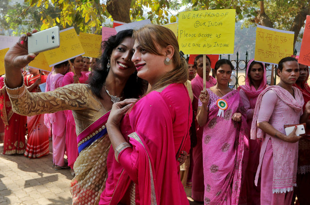 People belonging to the transgender community take a picture with a mobile phone before the start of a rally for transgender rights in Mumbai, India, January 13, 2017. (Photo by Shailesh Andrade/Reuters)