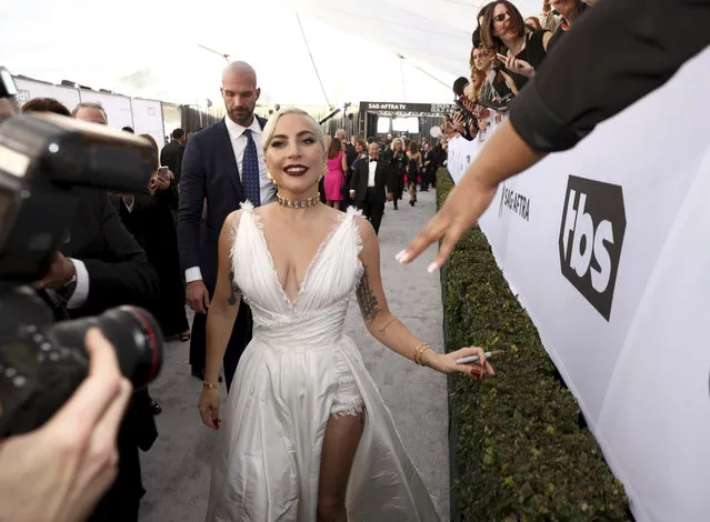 Lady Gaga interacts with fans at the 25th annual Screen Actors Guild Awards at the Shrine Auditorium & Expo Hall on Sunday, January 27, 2019, in Los Angeles. (Photo by Matt Sayles/Invision/AP Photo)