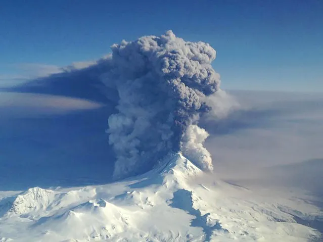The Pavlof Volcano spews ash in the Aleutian Islands of Alaska, U.S. on March 28, 2016. (Photo by Reuters/Courtesy Lieutenant Commander Nahshon Almandmoss/US Coast Guard)