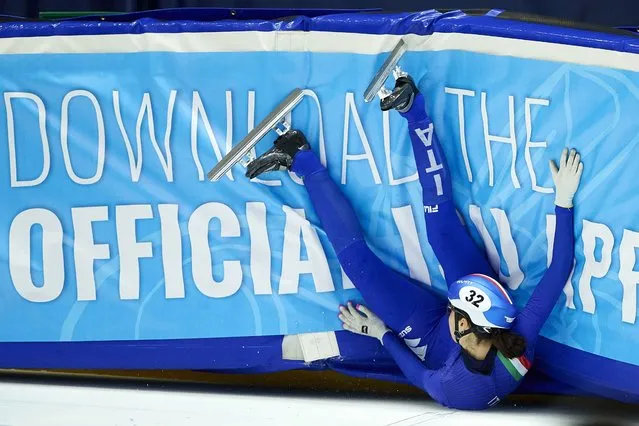Italy's Arianna Valcepina falls during the women's 500 m qualifying race at the ISU Short Track Speed Skating World Cup in Gdansk, Poland, 16 February 2024. (Photo by Adam Warzawa/EPA)