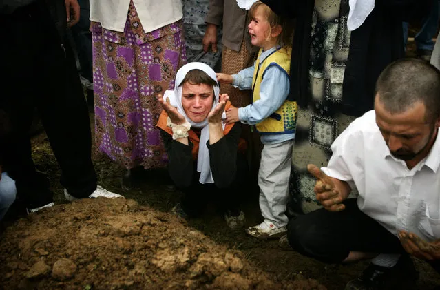 A Bosnian Muslim woman cries during a mass funeral for victims of the Srebrenica massacre in in Potocari, Bosnia in this July 11, 2005 file photo. The United Nations war crimes tribunal will hand down its verdict on March 24, 2016 in Bosnian Serb leader Radovan Karadzic's trial for genocide during Bosnia's 1992-95 war. (Photo by Damir Sagolj/Reuters)