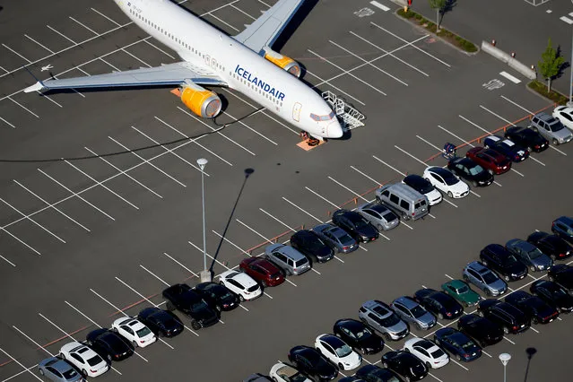 A grounded Icelandair Boeing 737 MAX aircraft is seen parked in a Boeing employee parking lot in an aerial photo at Boeing Field in Seattle, Washington, U.S. July 1, 2019. (Photo by Lindsey Wasson/Reuters)