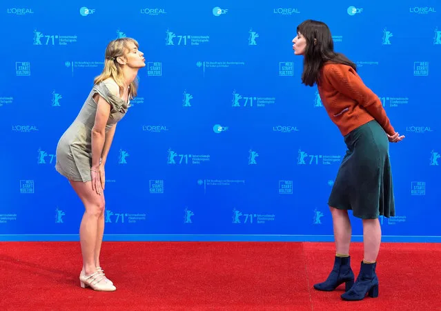Winner of the GWFF Best Feature Award at the Berlin International Film Festival, Dasha Nekrasova, and US writer and editor Madeline Quinn greet each other before the award ceremony at the 71st Berlinale Summer Festival in Berlin, Germany on June 13, 2021. (Photo by Tobias Schwarz/AFP Photo)