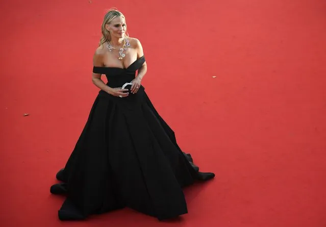 US actress and model Molly Sims poses as she arrives on May 19, 2017 for the screening of the film “Okja” at the 70th edition of the Cannes Film Festival in Cannes, southern France. (Photo by Antonin Thuillier/AFP Photo)