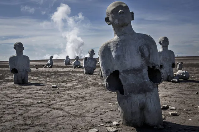 Survivor statues are displayed at mudflow areas to signify the lives of victims on May 27, 2016 in Sidoarjo, East Java, Indonesia. On 29 May, 2006, a mudflow eruption began in the Sidoarjo regency of Indonesia where nearly 40,000 villagers were displaced and twenty lives were lost, two days after a 6.3 magnitude earthquake struck the region. Indonesian oil and gas company, PT Lapindo Brantas, has been deemed to be partially responsible for the disaster and although compensations have been in the pipeline, its been slow to reach those affected. (Photo by Ulet Ifansasti/Getty Images)