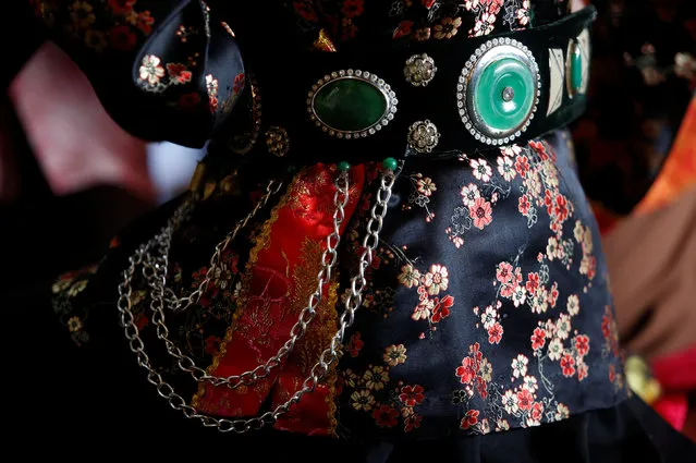 Details of medium Luong Nguyen's dress are seen as she performs during a ritual at a Hau Dong ceremony at Den Ngoc temple in Hanoi, Vietnam, February 12, 2017. (Photo by Reuters/Kham)