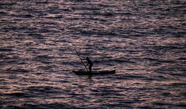 A Palestinian is fishing in the sea next the beach of Deir Al Balah town, southern Gaza Strip, 09 August 2024. More than 39,500 Palestinians and over 1,400 Israelis have been killed, according to the Palestinian Health Ministry and the Israel Defense Forces (IDF), since Hamas militants launched an attack against Israel from the Gaza Strip on 07 October 2023, and the Israeli operations in Gaza and the West Bank which followed it.  (Photo by Mohammed Saber/EPA)