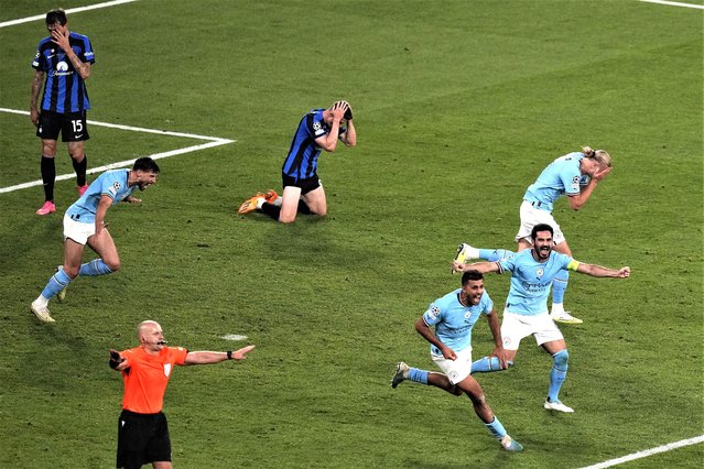 Manchster City players celebrate their 1-0 win at the end of the Champions League final soccer match between Manchester City and Inter Milan at the Ataturk Olympic Stadium in Istanbul, Turkey, Saturday, June 10, 2023. (Photo by Thanassis Stavrakis/AP Photo)