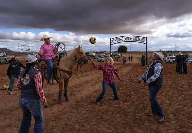 Navajo horsewomen circle pass a volleyball during the Western Navajo Fair in Tuba City, Ariz., Friday, October 18, 2024. Natives, which make up 5.2% of the state’s population, voted in big numbers for the Democratic party in 2020 and were credited with swinging the state blue for the first time in decades. (Photo by Rodrigo Abd/AP Photo)