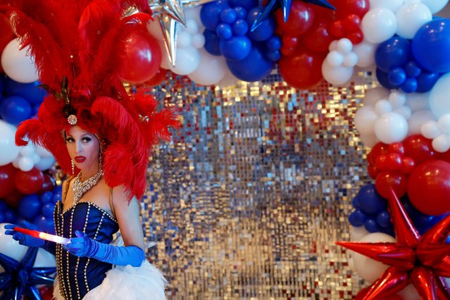 A showgirl attends a voting party at Las Vegas City Hall on Election Day in Las Vegas, Nevada, USA, 05 November 2024. Voters across the country are casting ballots today for President of the United States in a tightly contested race between Republican presidential candidate Donald J. Trump and Democratic presidential candidate US Vice President Kamala Harris, as well as for candidates in congressional and local races. (Photo by Caroline Brehman/EPA/EFE)