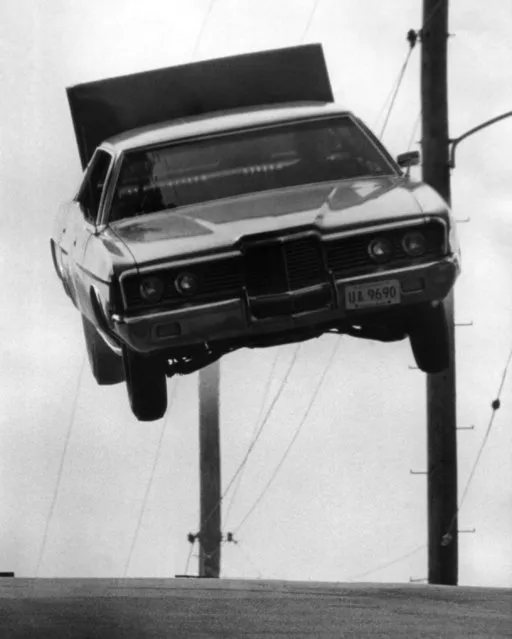 Stunt driver Eddie Mulber takes a high leap over a road hump in a chase scene for the movie production “Stingray” which is being shot in the St. Louis area, August 15, 1977. The movie, due for release next spring, is full of crashes and chase scenes. (Photo by AP Photo/DGM)