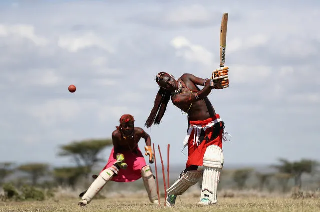 Sonyanga Ole Ng'ais captain of the Maasai Cricket Warriors bats during a practice session at Endana on August 23, 2017 in Laikipia, Kenya. The Maasai Cricket Warriors from Laikipia Maasai in Kenya are using their love for the game to convey messages and awareness against social injustices in their community. They are actively campaigning against degenerating and destructive cultural practices such as FGM (Female Genital Mutilation) and early childhood marriages, which are vigorously donating to the spread and increase in the cases of HIV/AIDS. The warriors use cricket to empower girls and woman, target substance and alcohol abuse and strive to build peace amongst communities. (Photo by Francois Nel/Getty Images)