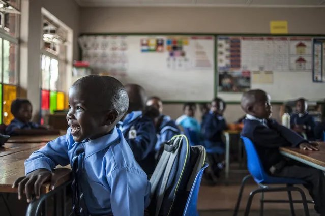 First grade students of Finetown Primary School are seen during the first day of the school year in Johannesburg, South Africa on January 14, 2015. (Photo by Ihsan Haffejee/Anadolu Agency/Getty Images)