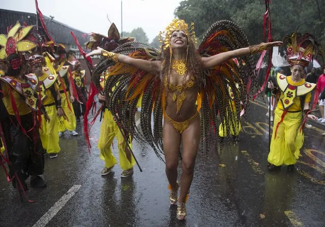 Performers take part in the Notting Hill Carnival in west London August 25, 2014. (Photo by Neil Hall/Reuters)